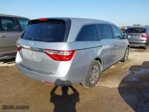 2012 Honda Odyssey EX with VIN 5FNRL5H44CB104919, listed as a IAAI auction lot 41991325 with 158,337 mi miles. Bid and sale history available at carsss.com. Image 4.