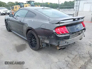 2019 Ford Mustang GT with VIN 1FA6P8CF0K5124320, listed as a IAAI auction lot 42314129 with 102,589 mi miles and . Bid and sale history available at DreamBid. Image 17.
