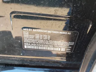 2019 BMW 5 Series 530e iPerformance with VIN WBAJA9C55KB392765, listed as a IAAI auction lot 41748610 with 60,834 mi miles. Bid and sale history available at carsss.com. Image 9.