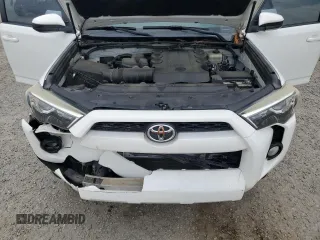 2017 Toyota 4Runner SR5 z VIN JTEBU5JR9H5424696, wystawiony jako Copart lot #58629325 z przebiegiem 154 702 mil mil oraz Szkoda całkowita • Salvage title. Historia ofert i sprzedaży dostępna na DreamBid. Obrazek 12.