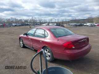 2003 Ford Taurus SE Standard with VIN 1FAFP53UX3G108418, listed as a IAAI auction lot 42042047 with 194,683 mi miles. Bid and sale history available at carsss.com. Image 3.