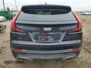 2022 Cadillac XT4 AWD Premium Luxury with VIN 1GYFZDR42NF147920, listed as a Copart auction lot 84058554 with 12,145 mi miles and Salvage Title. Bid and sale history available at carsss.com. Image 6.