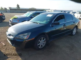 2003 Honda Accord LX with VIN JHMCM56393C012844, listed as a IAAI auction lot 42691503 with 237,784 mi miles and . Bid and sale history available at DreamBid. Image 2.