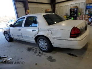 2006 Mercury Grand Marquis GS z VIN 2MEFM74V96X621050, wystawiony jako Copart lot #49098465 z przebiegiem 75 561 mil mil oraz Szkoda całkowita • Salvage title. Historia ofert i sprzedaży dostępna na DreamBid. Obrazek 2.