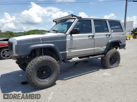 2000 Jeep Cherokee SE with VIN 1J4FF28SXYL140930, listed as a Copart auction lot 59191035 with 248,598 mi miles and Salvage title. Bid and sale history available at DreamBid. Image 1.