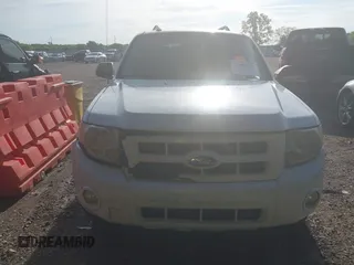 2009 Ford Escape Hybrid with VIN 1FMCU49399KC19803, listed as a IAAI auction lot 42004776 with 163,353 mi miles and . Bid and sale history available at DreamBid. Image 12.