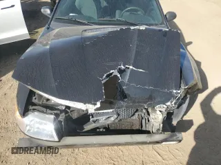2000 Ford Mustang z VIN 1FAFP4442YF105843, wystawiony jako Copart lot #51977385 z przebiegiem 176 981 mil mil oraz Szkoda całkowita • Salvage title. Historia ofert i sprzedaży dostępna na DreamBid. Obrazek 11.
