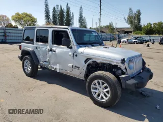 2023 Jeep Wrangler Willys with VIN 1C4HJXDNXPW702199, listed as a Copart auction lot 53815985 with 24,943 mi miles and Clean Title. Bid and sale history available at DreamBid. Image 4.