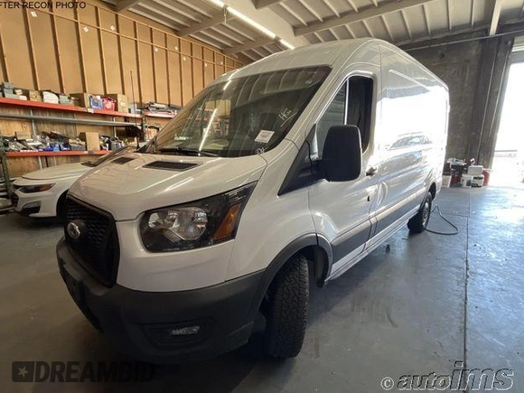 2021 Ford Transit Cargo with VIN 1FTBR1C81MKA05708, listed as a IAAI auction lot 42762772 with 67,631 mi miles and . Bid and sale history available at DreamBid. Image 3.