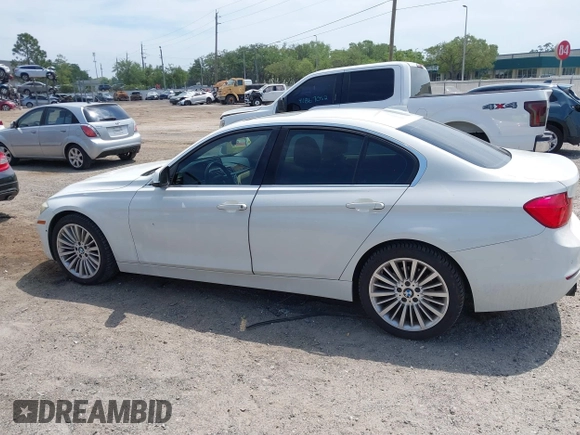 2012 BMW 3 Series 328i with VIN WBA3A5C51CF348290, listed as a IAAI auction lot 41867281 with 100,757 mi miles. Bid and sale history available at carsss.com. Image 14.