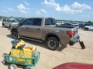 2021 Nissan Titan Pro-4X with VIN 1N6AA1EDXMN523826, listed as a Copart auction lot 61851765 with 85,783 mi miles and Salvage title. Bid and sale history available at DreamBid. Image 2.