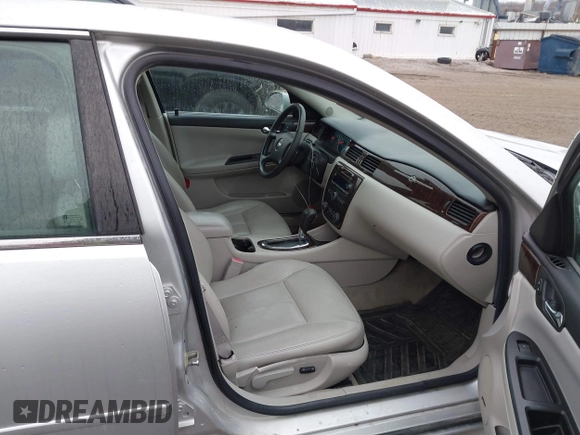 2014 Chevrolet Impala LTZ with VIN 2G1WC5E36E1125283, listed as a IAAI auction lot 41672856 with 150,361 mi miles and . Bid and sale history available at DreamBid. Image 5.
