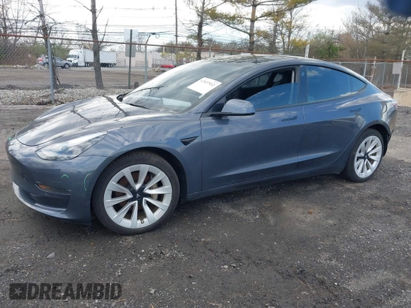 2022 Tesla Model 3 Long Range z VIN 5YJ3E1EB2NF203477, wystawiony jako IAAI lot #42037932 z przebiegiem 56 509 mil mil oraz . Historia ofert i sprzedaży dostępna na DreamBid. Obrazek 2.