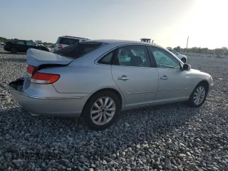 2006 Hyundai Azera SE with VIN KMHFC46F96A037972, listed as a Copart auction lot 61035765 with 140,857 mi miles and Salvage title. Bid and sale history available at DreamBid. Image 3.