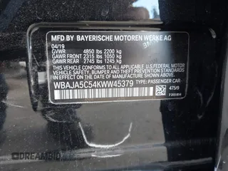 2019 BMW 5 Series 530i with VIN WBAJA5C54KWW45379, listed as a IAAI auction lot 41276092 with 77,025 mi miles. Bid and sale history available at carsss.com. Image 9.
