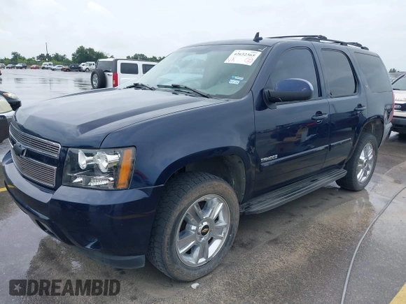 2007 Chevrolet Tahoe LT with VIN 1GNFC13J47R244713, listed as a IAAI auction lot 42632365 with 196,527 mi miles and . Bid and sale history available at DreamBid. Image 2.