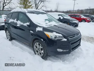 2016 Ford Escape Titanium with VIN 1FMCU9J96GUC08563, listed as a IAAI auction lot 41252475 with 120,404 mi miles. Bid and sale history available at carsss.com. Image 1.