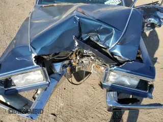 1990 Cadillac Brougham z VIN 1G6DW5476LR725075, wystawiony jako Copart lot #47456955 z przebiegiem Nie podano mil oraz Szkody całkowita. Historia ofert i sprzedaży dostępna na DreamBid. Obrazek 11.