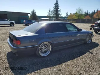 2001 BMW 7 Series 740iL with VIN WBAGH83401DP20569, listed as a Copart auction lot 52725335 with 152,575 mi miles and Salvage Title. Bid and sale history available at carsss.com. Image 3.