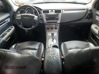 2010 Chrysler Sebring Limited with VIN 1C3CC5FD7AN133407, listed as a Copart auction lot 66102905 with 196,372 mi miles and Salvage title. Bid and sale history available at DreamBid. Image 8.