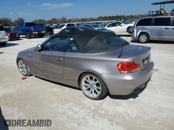 2013 BMW 1 Series 135i with VIN WBAUN7C52DVM26880, listed as a Copart auction lot 77858684 with 0 mi miles and Salvage Title. Bid and sale history available at carsss.com. Image 2.