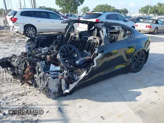 2022 Tesla Model S Plaid z VIN 5YJSA1E64NF477659, wystawiony jako IAAI lot #42358072 z przebiegiem Nie podano mil oraz . Historia ofert i sprzedaży dostępna na DreamBid. Obrazek 16.