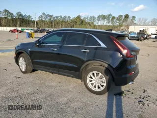 2023 Cadillac XT4 FWD Luxury with VIN 1GYAZAR49PF102307, listed as a Copart auction lot 49342465 with 21,093 mi miles and Salvage Title. Bid and sale history available at DreamBid. Image 2.