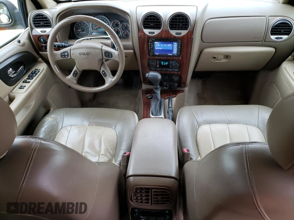 2004 GMC Envoy SLT with VIN 1GKDT13S342262833, listed as a Copart auction lot 87828975 with 203,404 mi miles and Salvage Title. Bid and sale history available at carsss.com. Image 8.