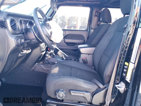 2022 Jeep Wrangler Unlimited High Tide with VIN 1C4HJXDG1NW134486, listed as a Copart auction lot 84936294 with 61,282 mi miles and Salvage Title. Bid and sale history available at DreamBid. Image 7.