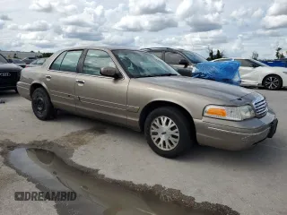 2003 Ford Crown Victoria LX с VIN 2FAHP74W63X124565, выставлен на аукционе Copart как лот 71051034 с пробегом 89 976 миль миль и Списание • Salvage title. История ставок и продаж доступна на DreamBid. Изображение 4.