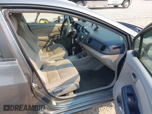 2010 Honda Insight EX with VIN JHMZE2H75AS027964, listed as a IAAI auction lot 41889301 with 136,485 mi miles and . Bid and sale history available at DreamBid. Image 5.