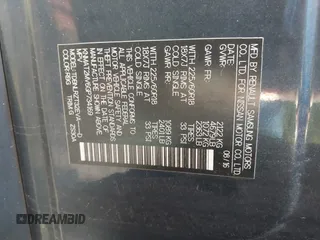 2016 Nissan Rogue SV with VIN KNMAT2MV6GP734169, listed as a IAAI auction lot 41112001 with 243,883 mi miles. Bid and sale history available at carsss.com. Image 9.