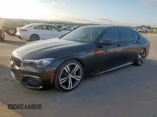2016 BMW 7 Series 740i with VIN WBA7E2C5XGG738986, listed as a Copart auction lot 62521315 with 85,616 mi miles and Clean title. Bid and sale history available at DreamBid. Image 1.