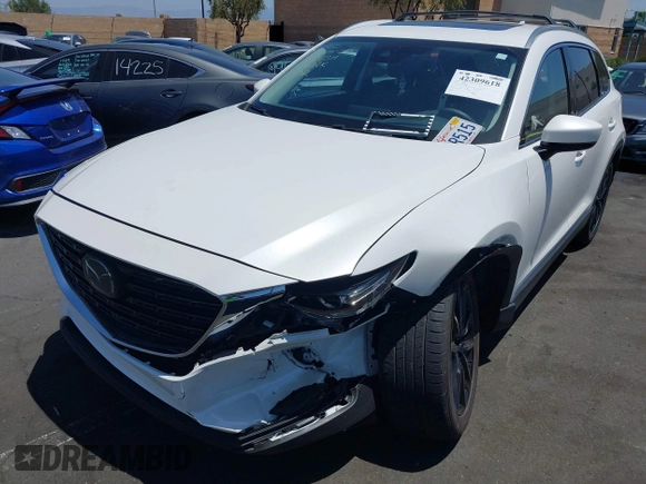 2023 Mazda CX-9 Touring Plus with VIN JM3TCBAY7P0636047, listed as a IAAI auction lot 42309618 with 20,821 mi miles and . Bid and sale history available at DreamBid. Image 18.