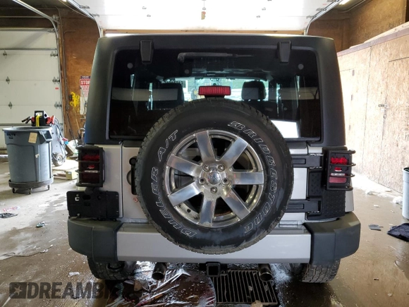 2012 Jeep Wrangler Arctic z VIN 1C4GJWBG2CL237343, wystawiony jako Copart lot #64674015 z przebiegiem 72 750 mil mil oraz Szkoda całkowita • Salvage title. Historia ofert i sprzedaży dostępna na DreamBid. Obrazek 6.