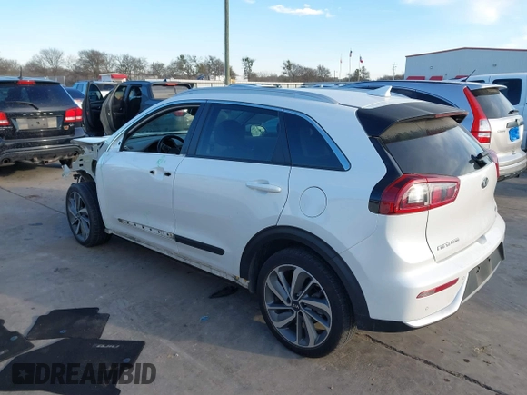 2018 Kia Niro Touring with VIN KNDCE3LC7J5179521, listed as a IAAI auction lot 41310921 with 75,620 mi miles. Bid and sale history available at carsss.com. Image 3.