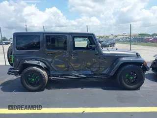 2017 Jeep Wrangler Unlimited Sahara with VIN 1C4BJWEG2HL612421, listed as a IAAI auction lot 42355409 with 81,708 mi miles and . Bid and sale history available at DreamBid. Image 13.