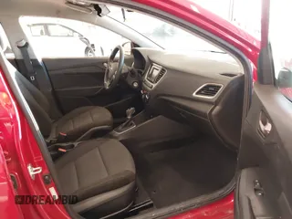 2021 Hyundai Accent SE with VIN 3KPC24A61ME130318, listed as a IAAI auction lot 41365574 with 89,570 mi miles. Bid and sale history available at carsss.com. Image 5.
