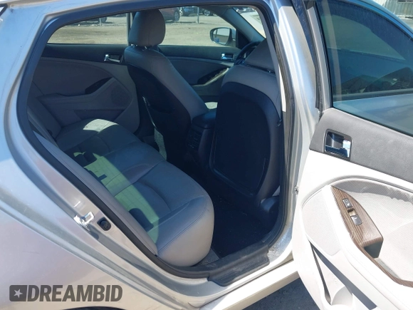 2013 Kia Optima EX with VIN 5XXGN4A73DG108068, listed as a IAAI auction lot 42059774 with 210,179 mi miles and . Bid and sale history available at carsss.com. Image 8.