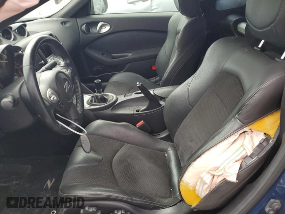 2013 Nissan 370Z with VIN JN1AZ4EH6DM880252, listed as a Copart auction lot 70528464 with 63,111 mi miles and Salvage Title. Bid and sale history available at carsss.com. Image 7.