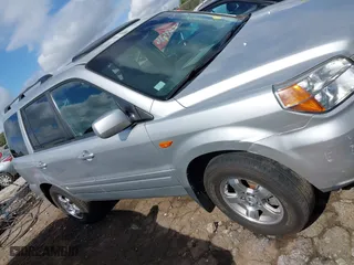 2008 Honda Pilot SE with VIN 5FNYF28338B030585, listed as a IAAI auction lot 40740293 with 210,626 mi miles. Bid and sale history available at carsss.com. Image 13.