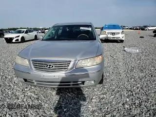 2006 Hyundai Azera SE with VIN KMHFC46F96A037972, listed as a Copart auction lot 61035765 with 140,857 mi miles and Salvage title. Bid and sale history available at DreamBid. Image 13.