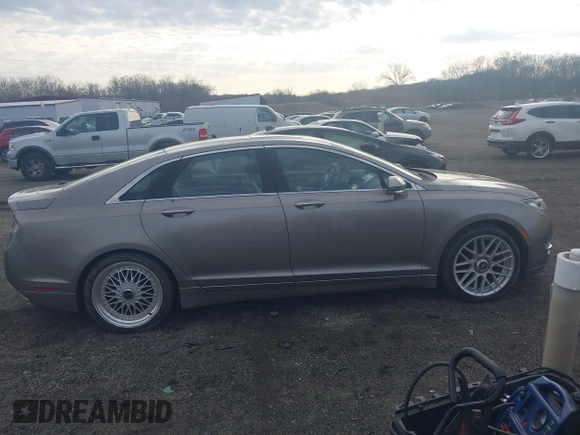 2015 Lincoln MKZ with VIN 3LN6L2J98FR620089, listed as a IAAI auction lot 41805555 with Not provided miles and . Bid and sale history available at DreamBid. Image 12.