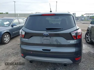 2017 Ford Escape Titanium z VIN 1FMCU0JD9HUE03672, wystawiony jako IAAI lot #42411549 z przebiegiem 89 846 mil mil oraz . Historia ofert i sprzedaży dostępna na DreamBid. Obrazek 16.