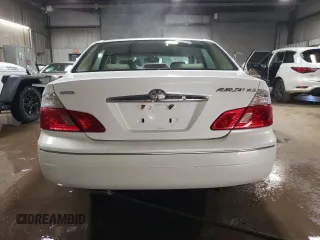 2003 Toyota Avalon XL with VIN 4T1BF28B73U330445, listed as a Copart auction lot 49662095 with 106,597 mi miles and Salvage Title. Bid and sale history available at carsss.com. Image 6.
