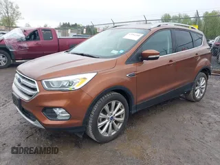 2017 Ford Escape Titanium with VIN 1FMCU0JD3HUB20846, listed as a IAAI auction lot 42182260 with 28,610 mi miles and . Bid and sale history available at DreamBid. Image 2.