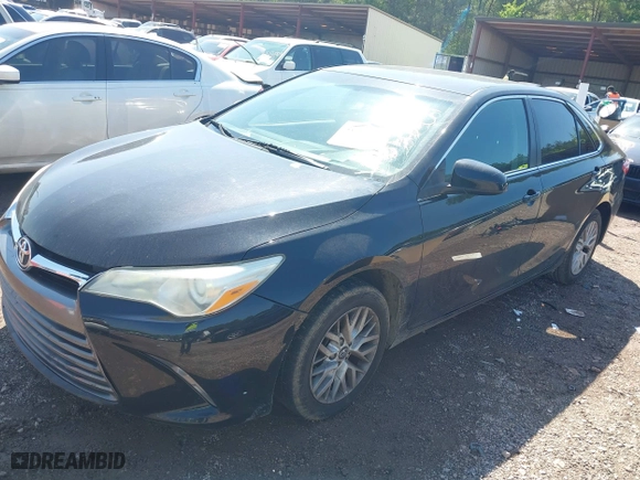 2016 Toyota Camry XLE with VIN 4T4BF1FK8GR584657, listed as a IAAI auction lot 41994436 with 212,401 mi miles. Bid and sale history available at carsss.com. Image 17.