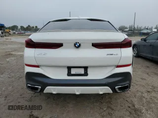 2021 BMW X6 sDrive40i z VIN 5UXCY4C08M9F34312, wystawiony jako Copart lot #87206474 z przebiegiem 67 851 mil mil oraz Czysty tytuł • Clean title. Historia ofert i sprzedaży dostępna na DreamBid. Obrazek 6.