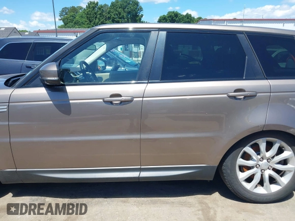 2015 Land Rover Range Rover Sport HSE z VIN SALWR2VF1FA531194, wystawiony jako IAAI lot #42344714 z przebiegiem 130 981 mil mil oraz . Historia ofert i sprzedaży dostępna na DreamBid. Obrazek 14.