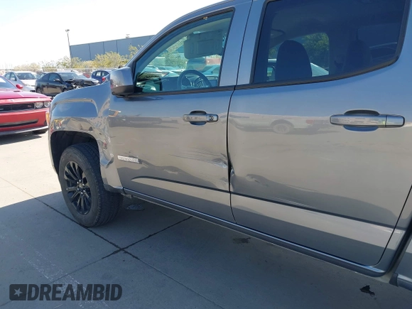 2022 GMC Canyon 4WD Elevation z VIN 1GTG6CENXN1304361, wystawiony jako IAAI lot #41990960 z przebiegiem 23 151 mil mil oraz . Historia ofert i sprzedaży dostępna na DreamBid. Obrazek 6.